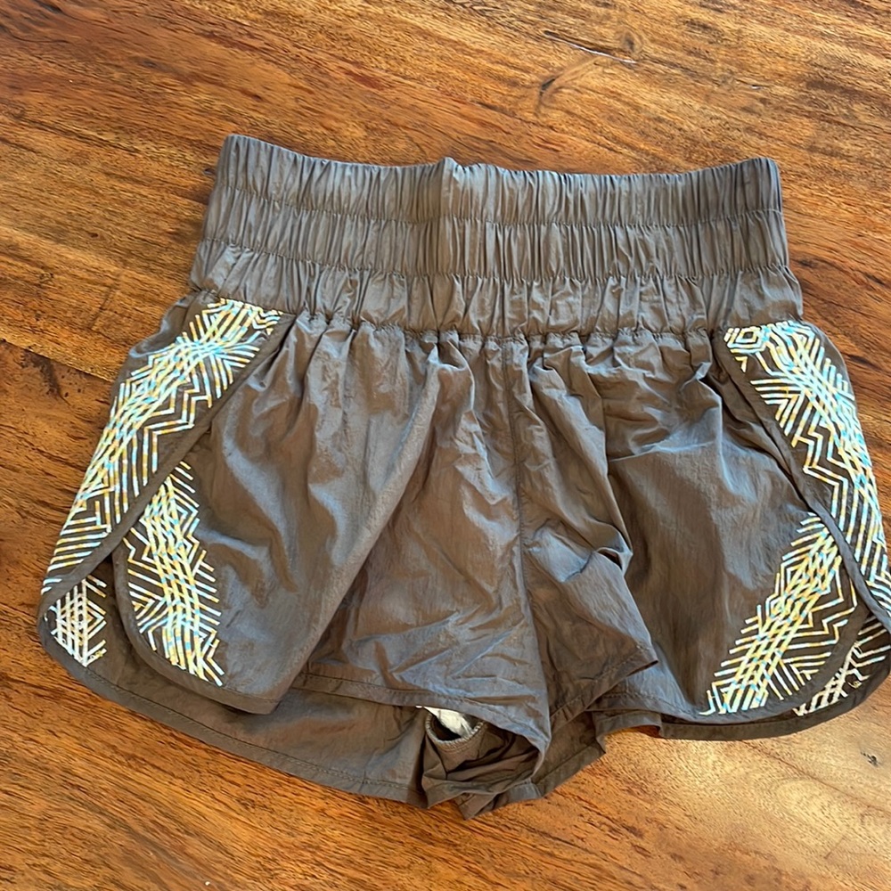 Free People Movement running shorts. Rich brown with wide waistband.